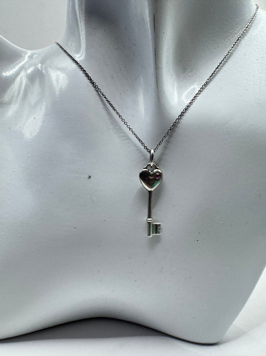 Tiffany & Co. Sterling Silver Heart Key Necklace with Pink Sapphire