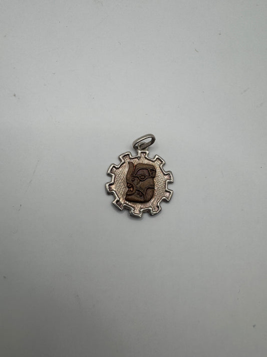 Vintage Sterling Silver Tribal Sun Pendant with Carved Face