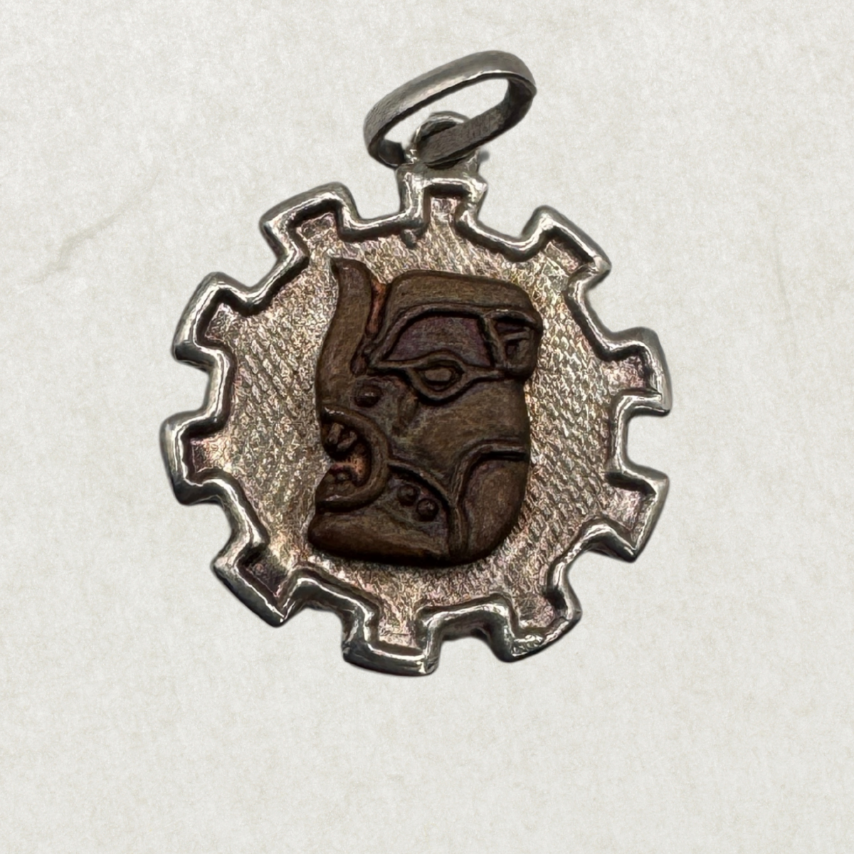 Vintage Sterling Silver Tribal Sun Pendant with Carved Face