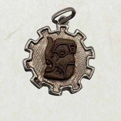 Vintage Sterling Silver Tribal Sun Pendant with Carved Face