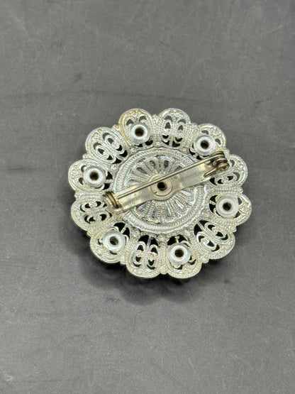 Vintage Silver-Tone Filigree Brooch with Red Stones