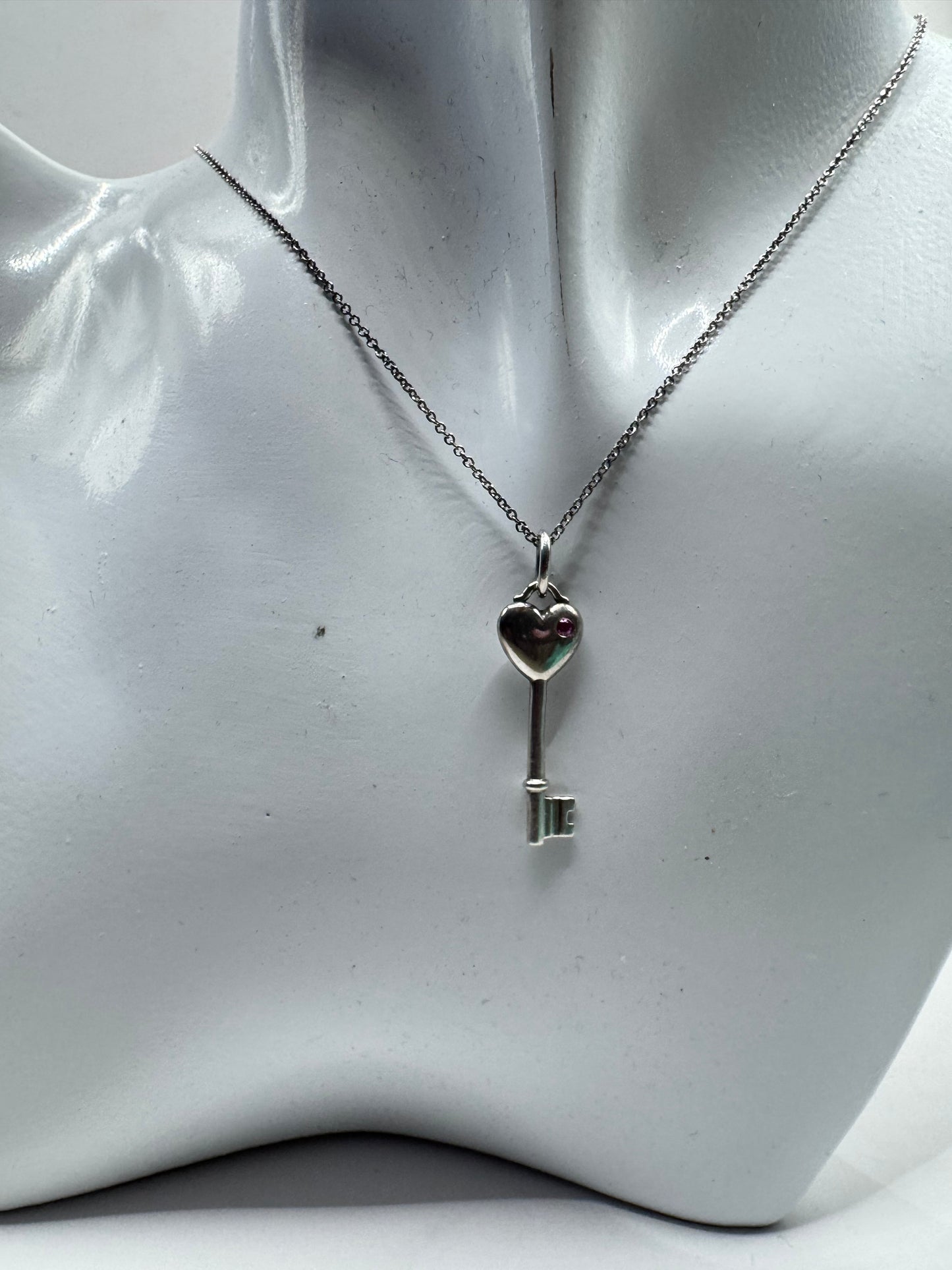 Tiffany & Co. Sterling Silver Heart Key Necklace with Pink Sapphire