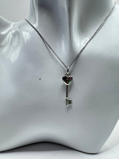 Tiffany & Co. Sterling Silver Heart Key Necklace with Pink Sapphire
