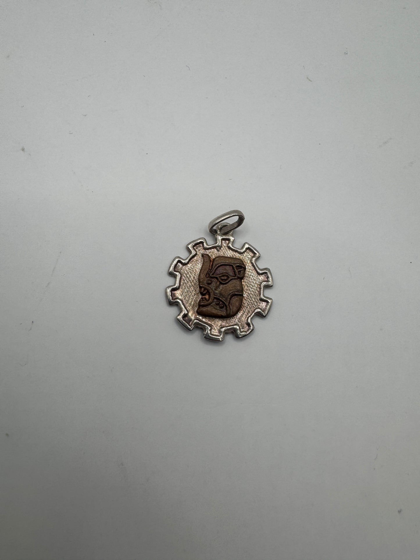 Vintage Sterling Silver Tribal Sun Pendant with Carved Face