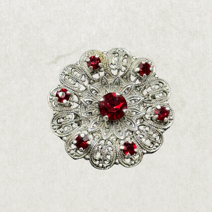 Vintage Silver-Tone Filigree Brooch with Red Stones