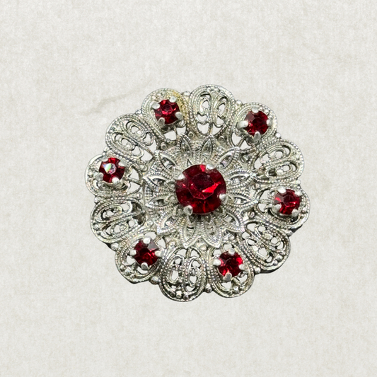 Vintage Silver-Tone Filigree Brooch with Red Stones