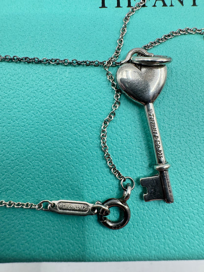Tiffany & Co. Sterling Silver Heart Key Necklace with Pink Sapphire